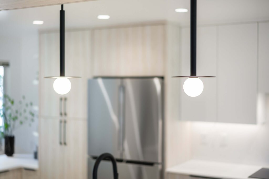Detail of the pendant light fixtures over the kitchen island.