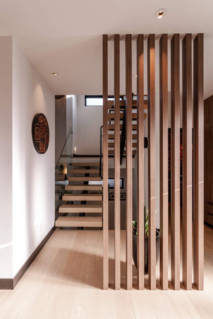 The Summerfell house tour begins in the entryway which features a slatted wall.