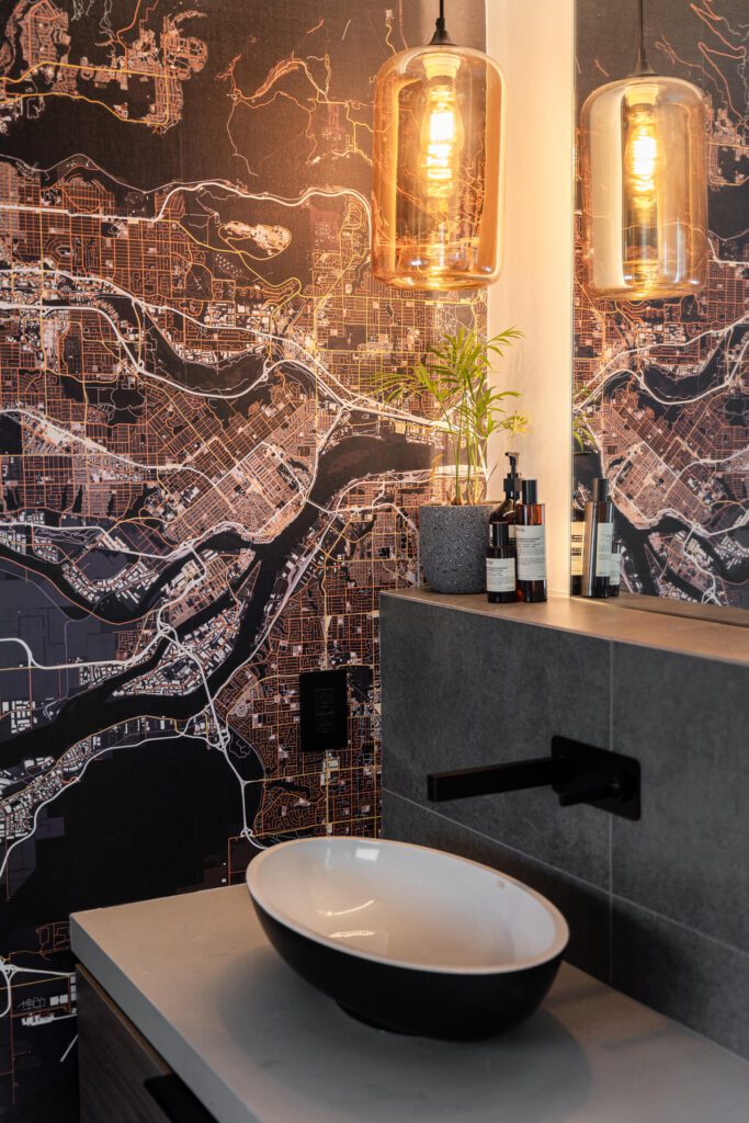 The powder room features a large map of Vancouver.