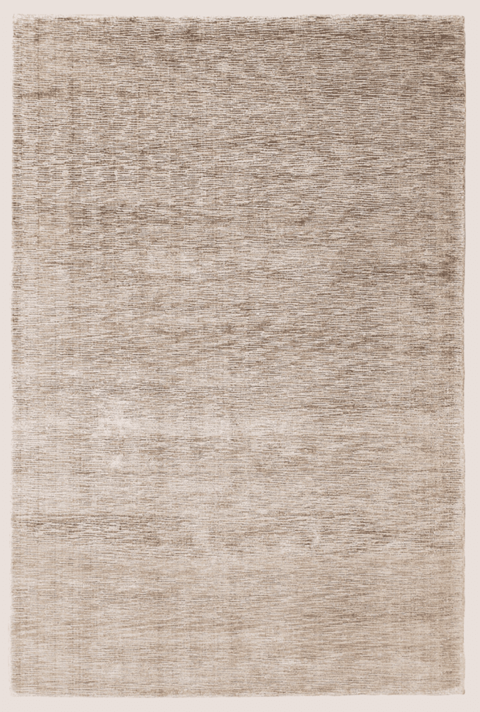A neutral area rug made from banana fibres.