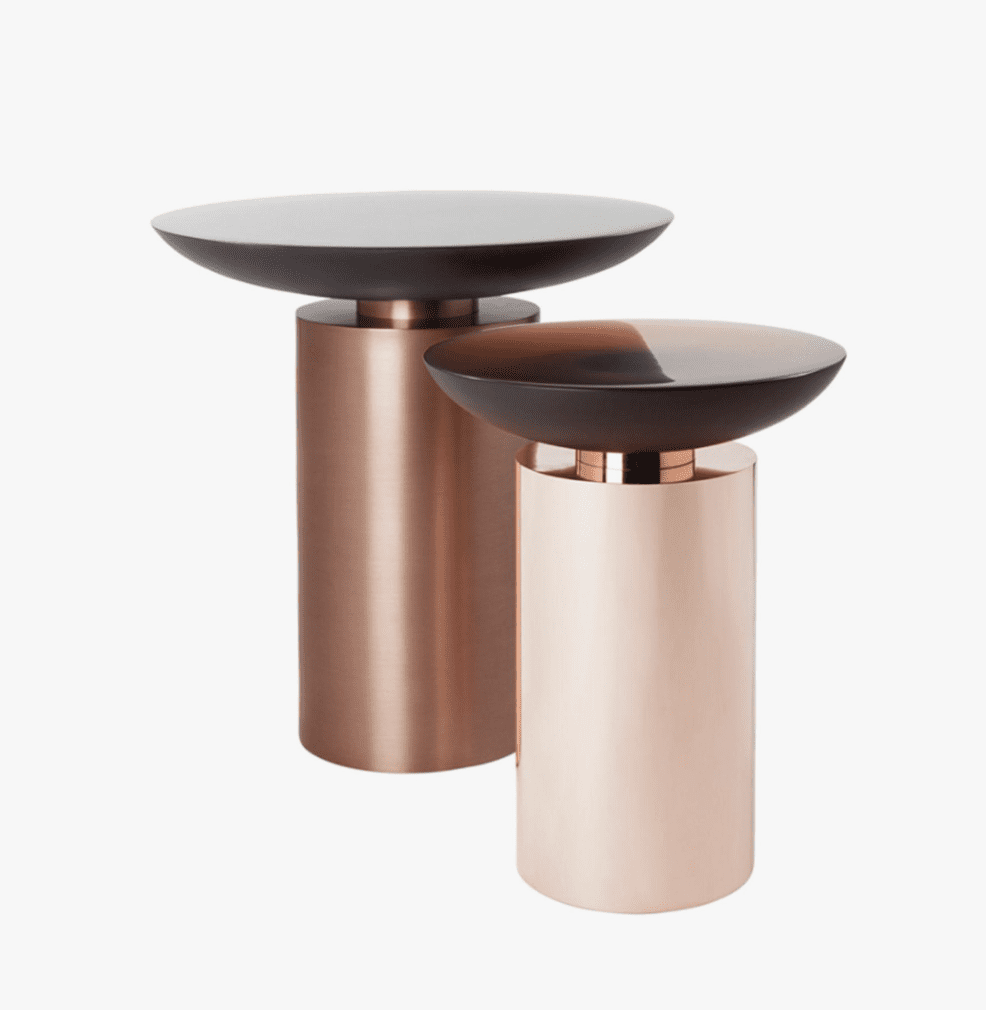 Resin side tables in warm brown tones.
