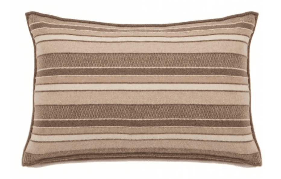 A toss pillow featuring Pantone's colour of the year Mocha Mousse.