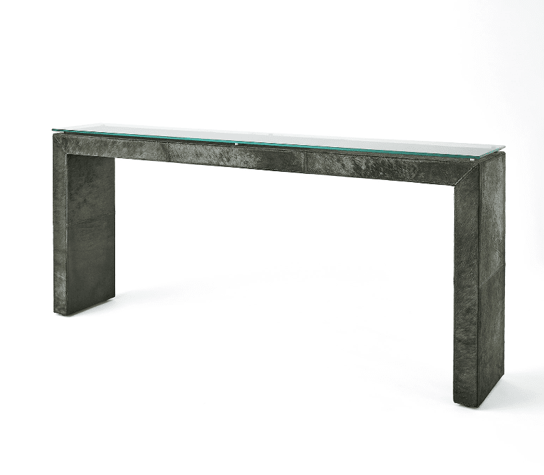 A hair-on-hide wrapped console table showing the colour trend of olive green