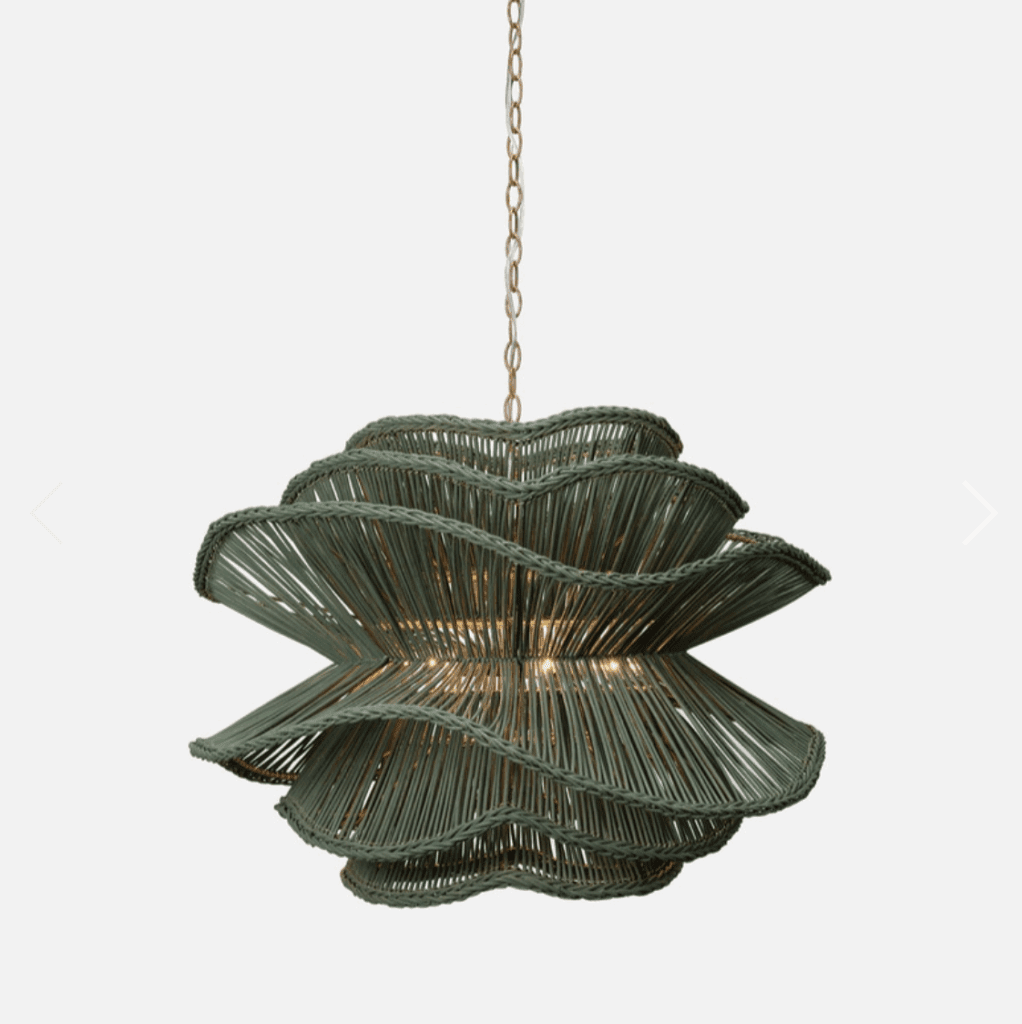 A rattan pendant light in a deep shade of olive green