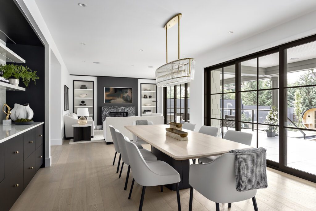 Dining room and living room beyond in the Edgemont family home in North Vancouver